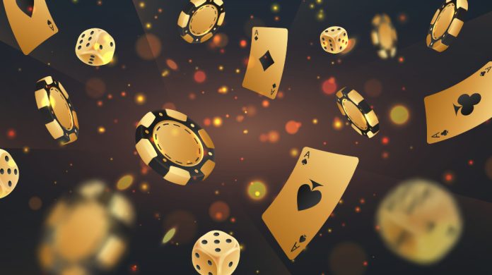 Golden casino cards, chips, and dice